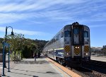 Amtrak San Joaquin Train # 716 about to make its stop with California Bilevel Car # 8311 as the leader